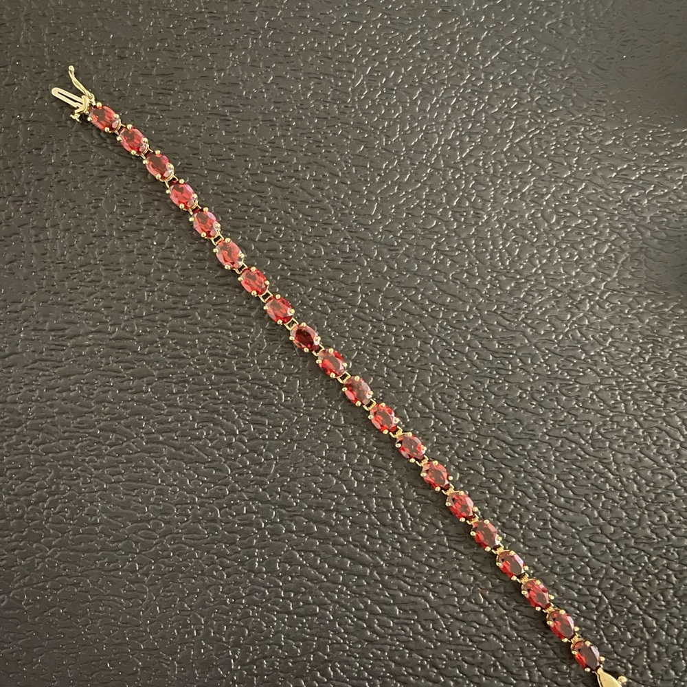 14k Gold and 10carat Garnet Tennis Bracelet